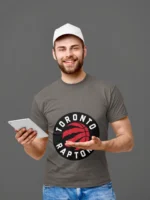 Dive into the essence of Toronto Raptors basketball with this unique and comfortable shirt.