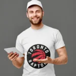 Dive into the essence of Toronto Raptors basketball with this unique and comfortable shirt.