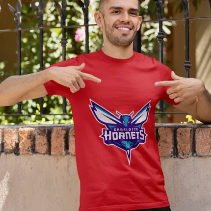 Whether you're cheering courtside or repping your team on the streets, this tee is a must-have for any true Charlotte Hornets enthusiast.