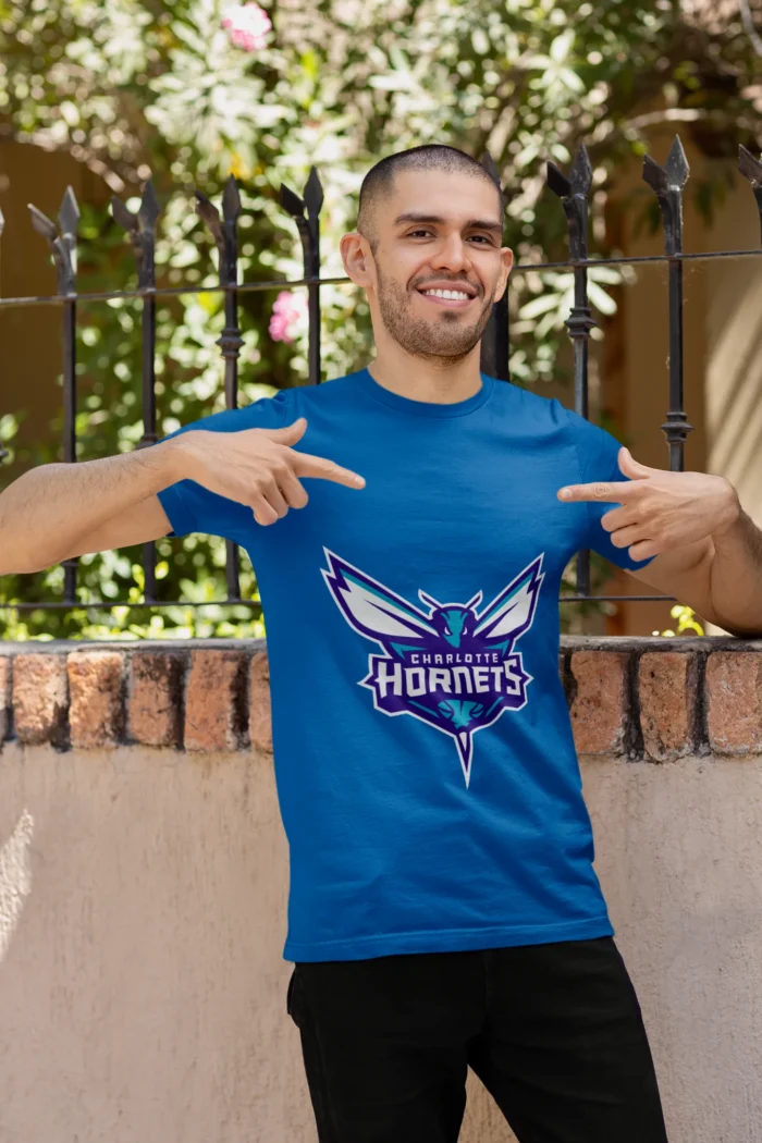 Whether you're cheering courtside or repping your team on the streets, this tee is a must-have for any true Charlotte Hornets enthusiast.