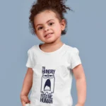 "Feed Me Human" amidst a backdrop of delightful hues.