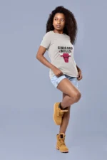 Dive into the world of fashion-forward fandom with our unique Chicago Bulls Women's Tee - a wardrobe essential for those who play to win, both on and off the court.