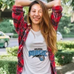 Crafted with passion and designed for the modern woman, this tee seamlessly blends style with team pride. Embrace the magic both on and off the court.