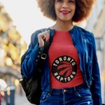 Elevate your game-day wardrobe and embrace the vibrant energy of the Raptors with this exclusive women's tee.