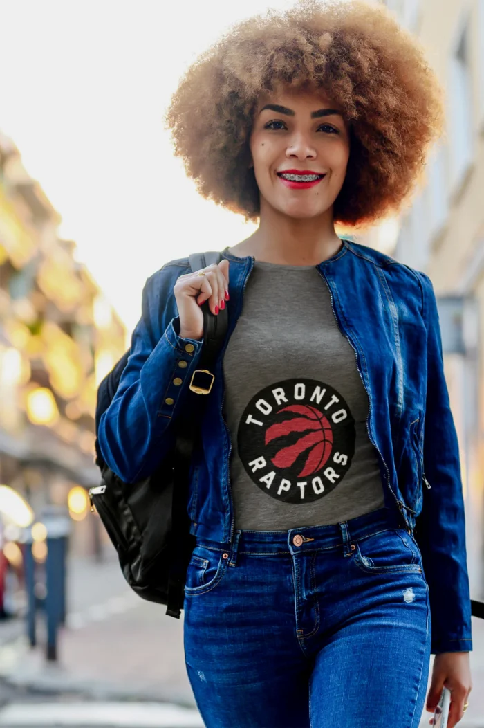 Elevate your game-day wardrobe and embrace the vibrant energy of the Raptors with this exclusive women's tee.