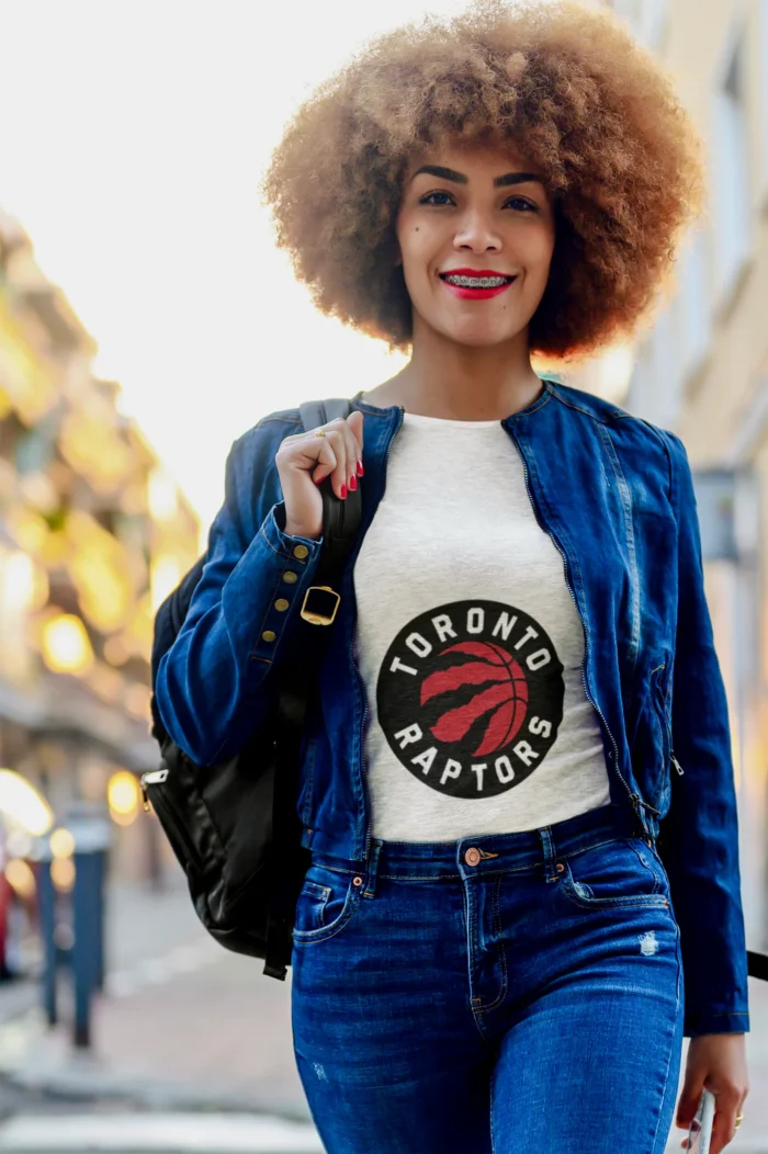 Elevate your game-day wardrobe and embrace the vibrant energy of the Raptors with this exclusive women's tee.