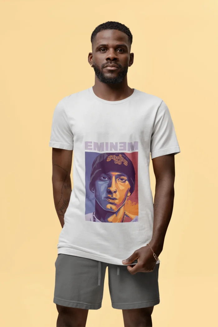 Unleash your inner rhythm with our exclusive "Rap Lyricist Reverie" Eminem Graphic Tee. Crafted for true enthusiasts of Eminem's unparalleled lyrical prowess, this shirt is a tribute to the iconic wordsmith. Dive into the world of intricate rhymes and unapologetic self-expression with every wear.