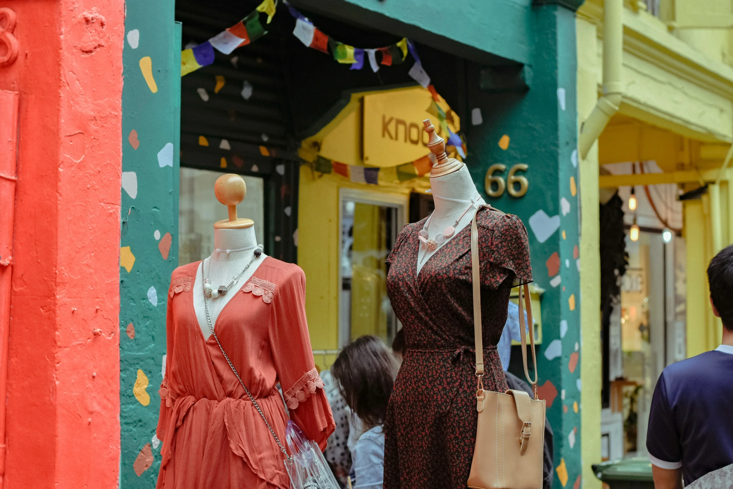 stylish sundress paired with a wide-brimmed hat, ideal for a resort vacation