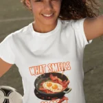 Girl wearing 'What's Smells So Good?' t-shirt with trendy design