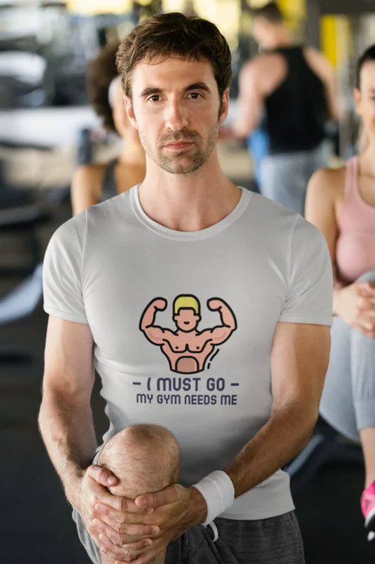 "I Must Go GYM" t-shirt for men in breathable cotton, perfect for workouts and casual wear.