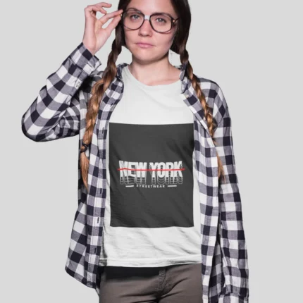 Stylish girl wearing a New York streetwear t-shirt, featuring bold urban designs