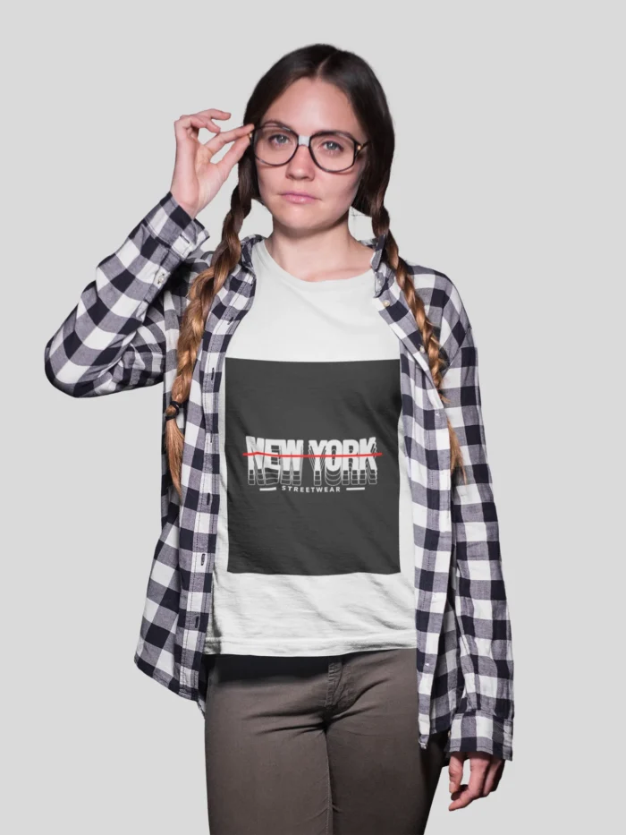 Stylish girl wearing a New York streetwear t-shirt, featuring bold urban designs