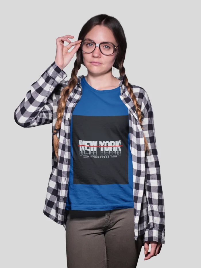 Stylish girl wearing a New York streetwear t-shirt, featuring bold urban designs