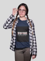 Stylish girl wearing a New York streetwear t-shirt, featuring bold urban designs