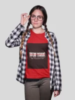 Stylish girl wearing a New York streetwear t-shirt, featuring bold urban designs