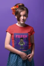 Stylish girl wearing a "Fresh Character" t-shirt with a vibrant, playful design