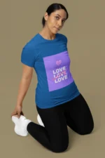 Women's "Love Wins" t-shirt featuring a bold, positive message in a stylish design.