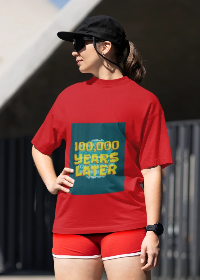 100,000 Years Later meme t-shirt for women featuring a humorous graphic in a comfortable, casual fit.