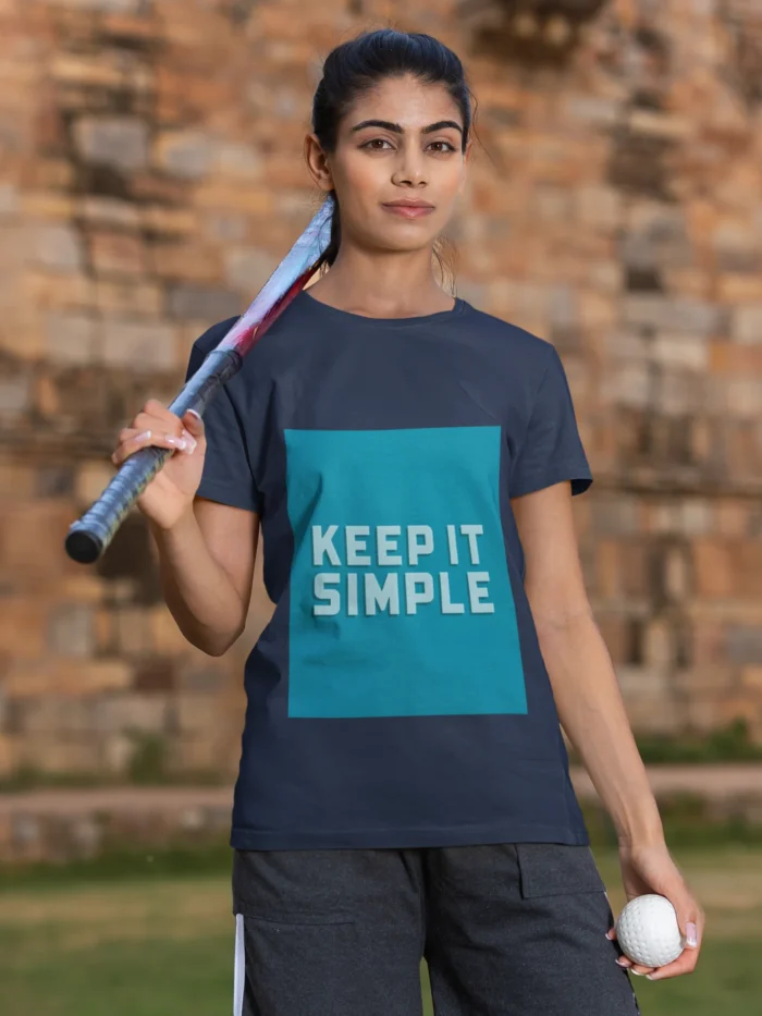 Women's "Keep It Simple" t-shirt in white, showcasing a minimalist design with elegant lettering.