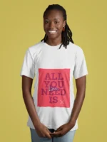 Women wearing "All You Need Is Love" t-shirt, featuring a minimalist heart design on soft cotton fabric.