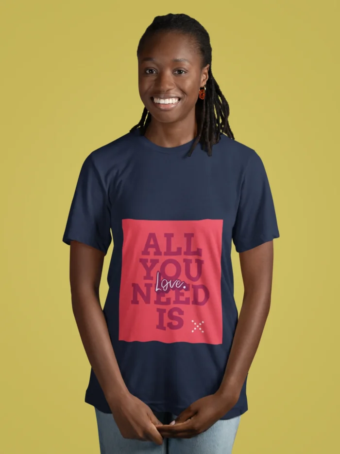 Women wearing "All You Need Is Love" t-shirt, featuring a minimalist heart design on soft cotton fabric.