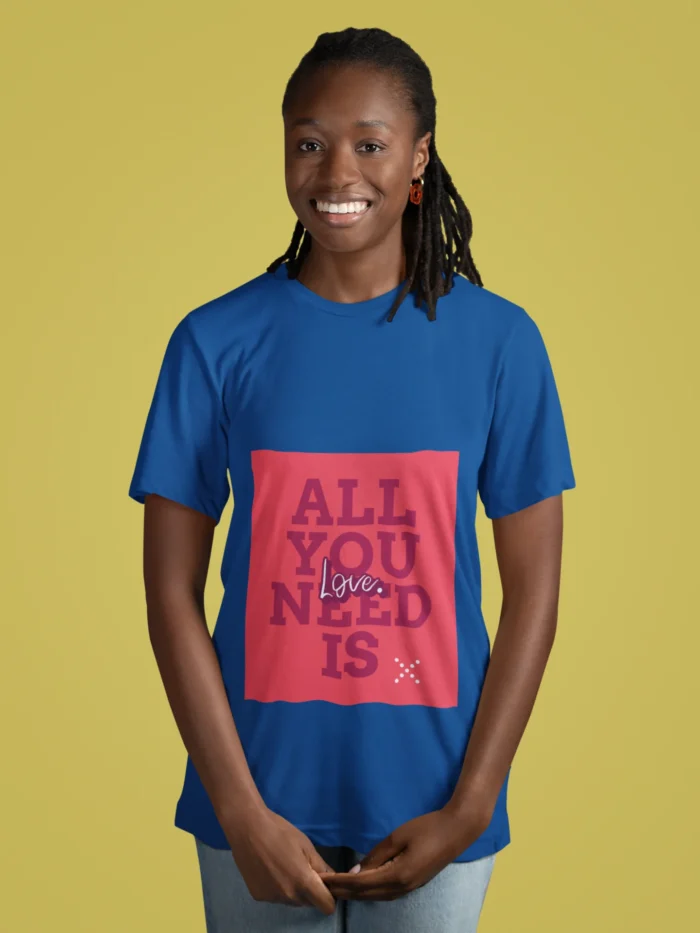 Women wearing "All You Need Is Love" t-shirt, featuring a minimalist heart design on soft cotton fabric.