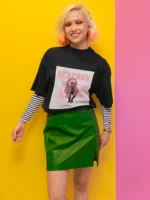 Woman wearing a "Beatbox and Drama Queen" t-shirt, showcasing a stylish blend of musical and dramatic elements.