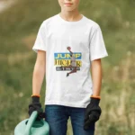 A young boy wearing the NBA "Jump Higher, Sky Is the Limit" t-shirt, leaping with a basketball under a vibrant sky, symbolizing determination and ambition.