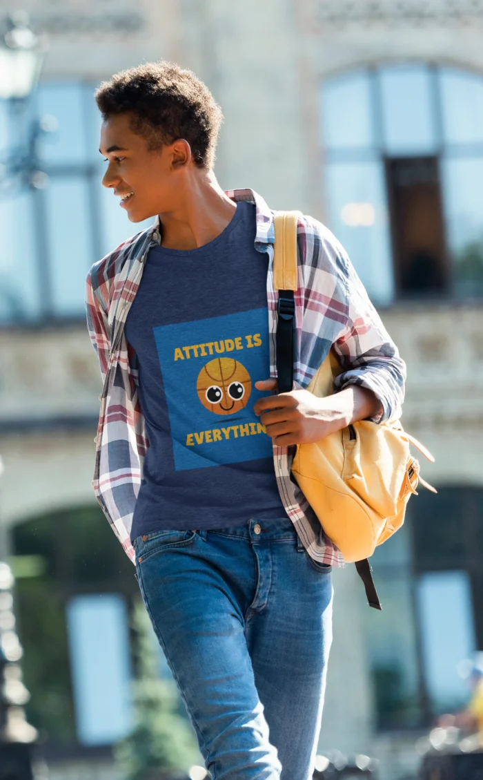 Boys wearing Attitude in Basketball t-shirts, confidently posing on a basketball court.