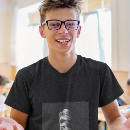 Boy wearing "Change the Game" basketball t-shirt, showcasing bold graphic design and athletic fit.