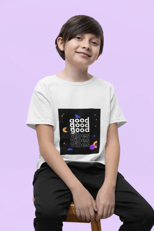 Boys wearing a "Good Vibes Might Version" t-shirt with bold lettering and casual design.