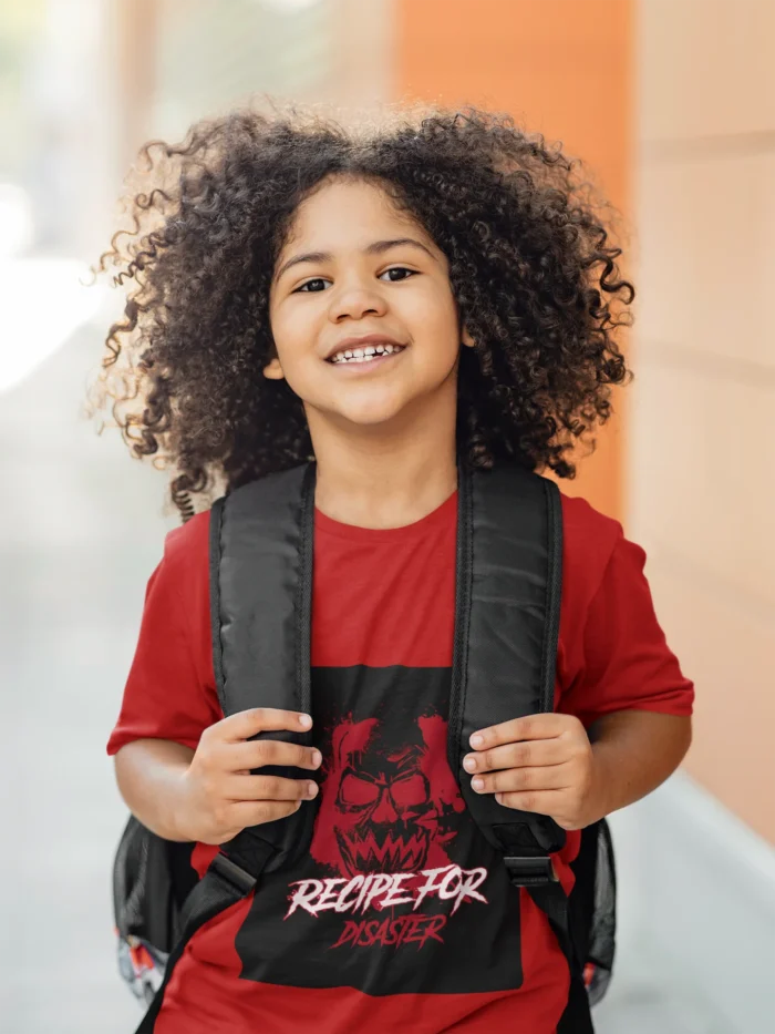 Boys wearing Recipe for Disaster t-shirt with bold graphic design.