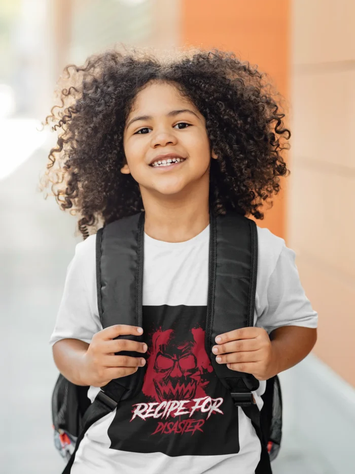 Boys wearing Recipe for Disaster t-shirt with bold graphic design.