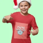 Boys' t-shirt featuring a cute, colorful monster illustration, perfect for active kids.