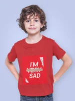 Boy wearing an "I'm Sad" graphic t-shirt with bold text design, expressing an emotional yet trendy statement.