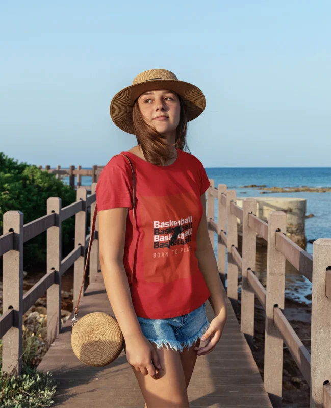 Born to Play Basketball girls' t-shirt featuring a bold basketball graphic.