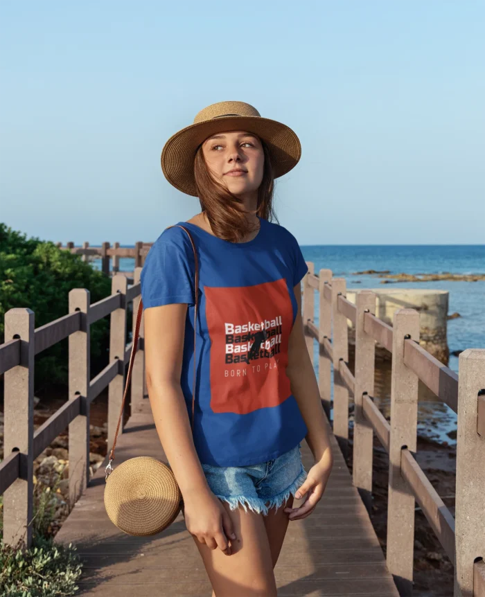 Born to Play Basketball girls' t-shirt featuring a bold basketball graphic.